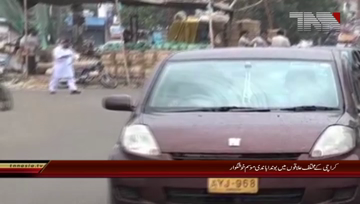 karachi light drizzle breezy weather