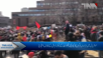 Thousands march in Montreal to denounce Quebec government's secularism bill.