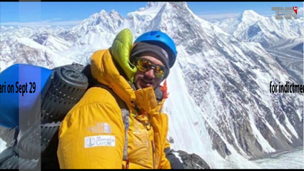 Lahore- Pakistani Climber Shahrooz hoists the national flag at the 8163-meter-high Manaslu peak in Nepal